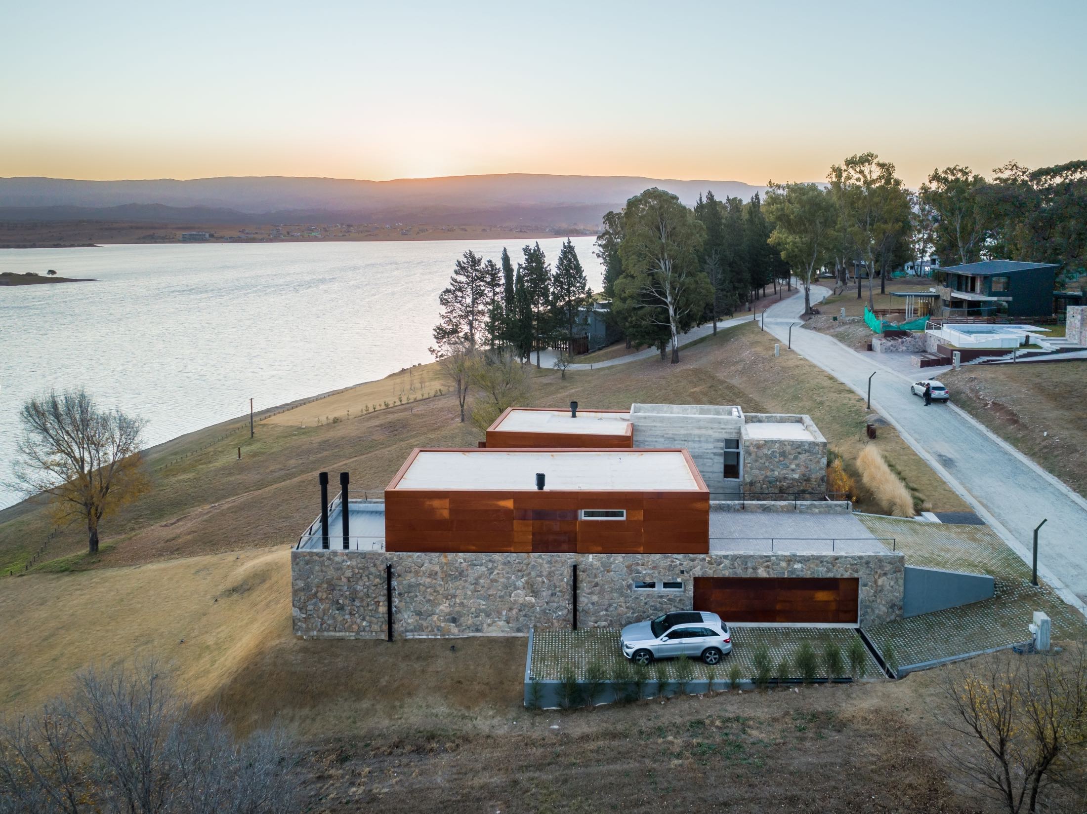 riverside house with stone walls